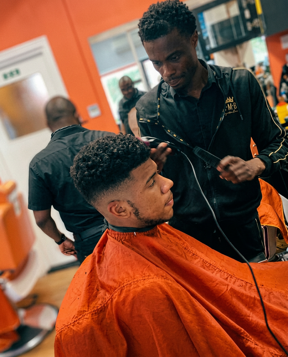 Barber and client inside Extreme Kutz on Lattimore Road